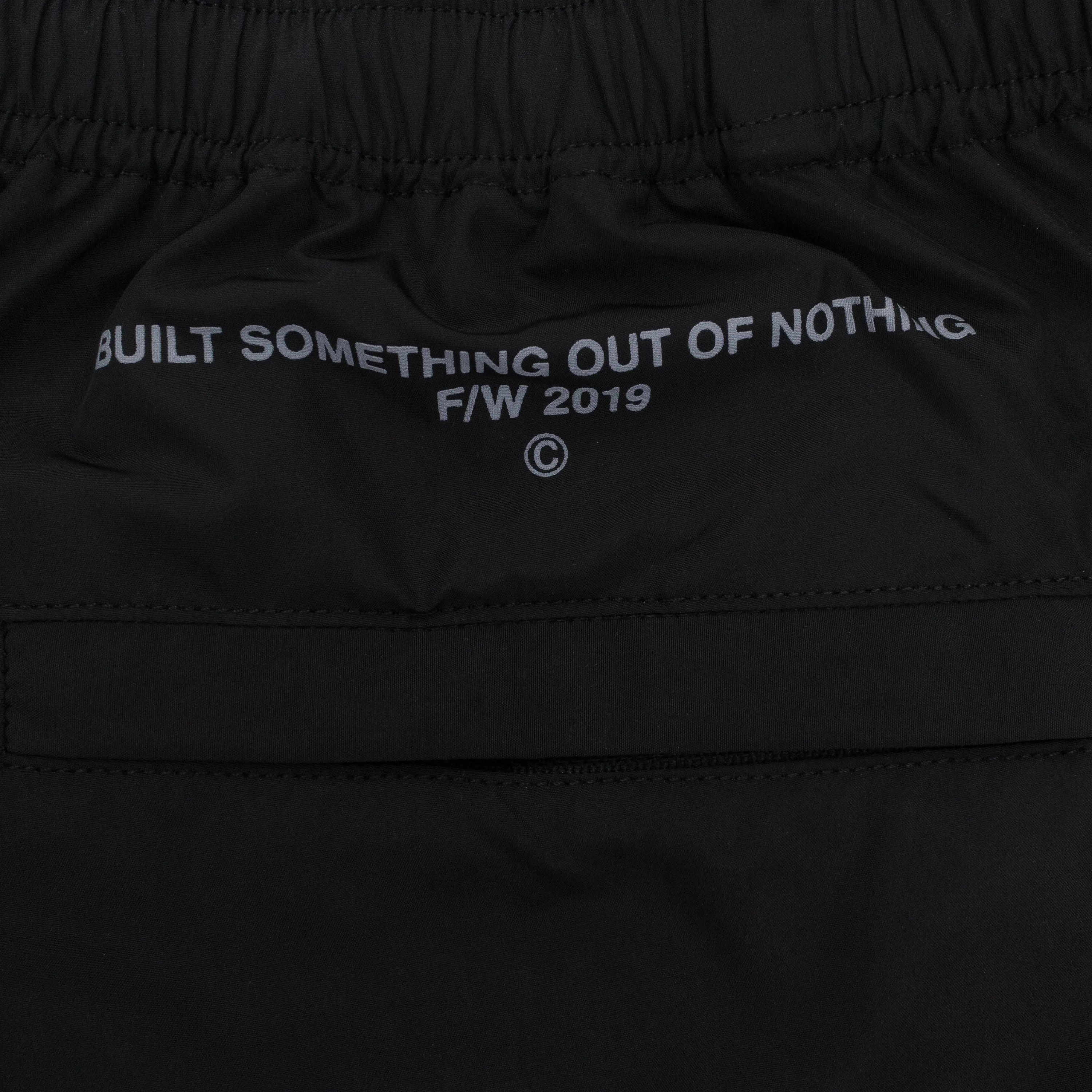 BLACK WIND TRACK PANTS