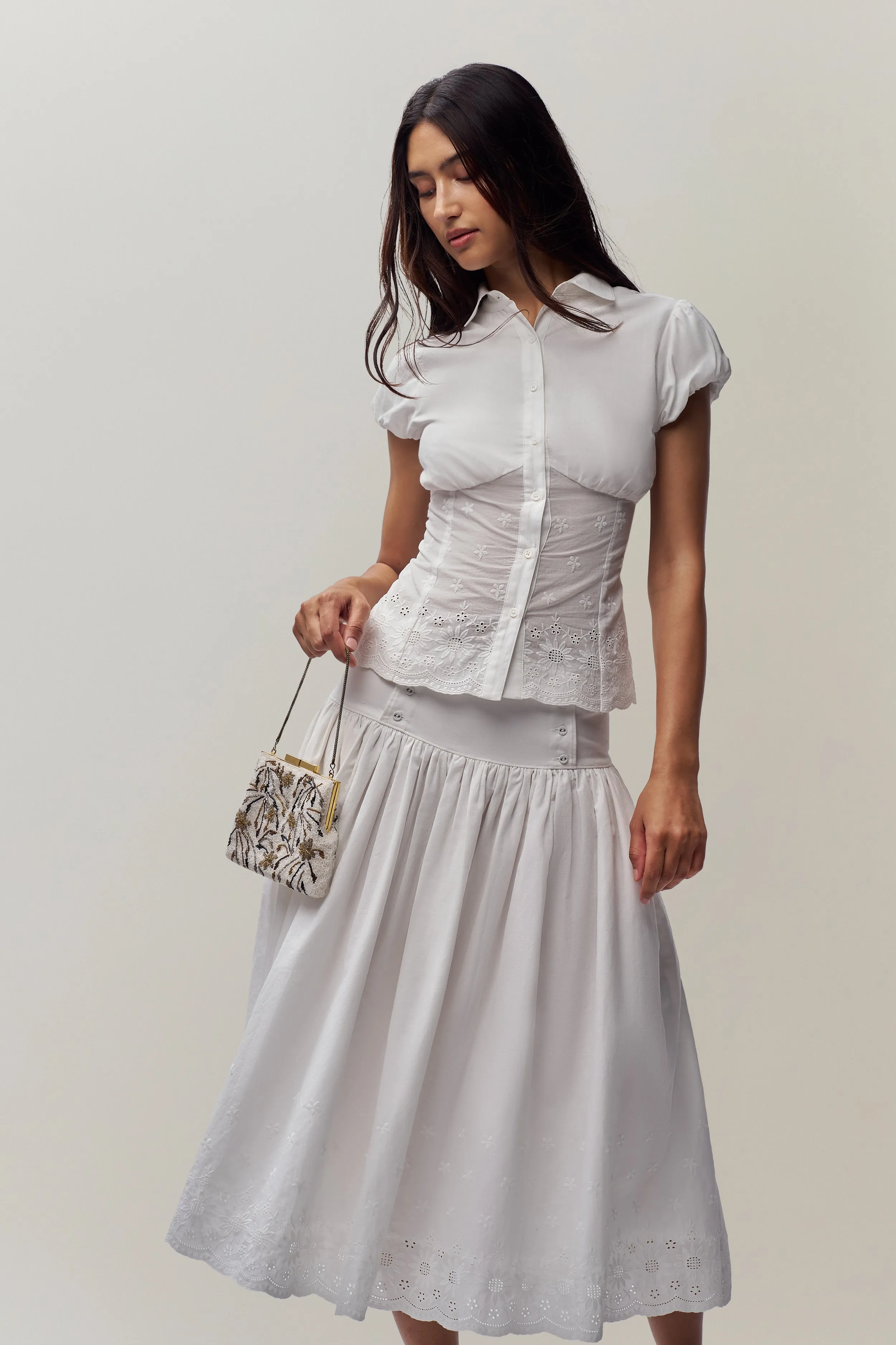 Elegant Rinka Embroidered Blouse with Intricate Detailing and Lightweight Fabric